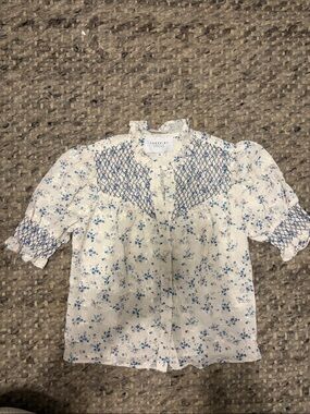 The shirt Blue Floral Smocked Peasant Blouse